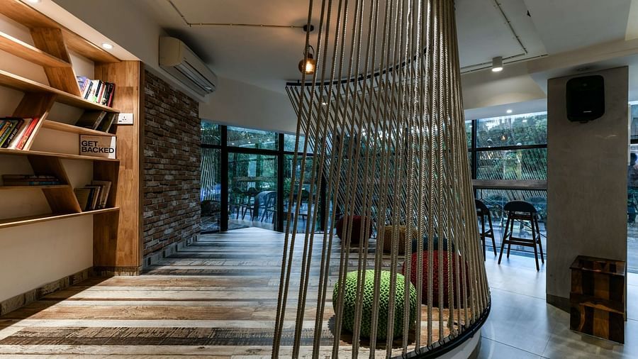 Decorative bamboo vines leading to a corridor at Indie Stays, BKC Kalina.