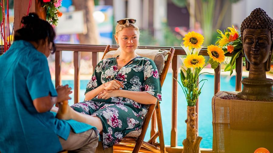woman enjoys a pedicure at the resort - Rhythm Lonavala