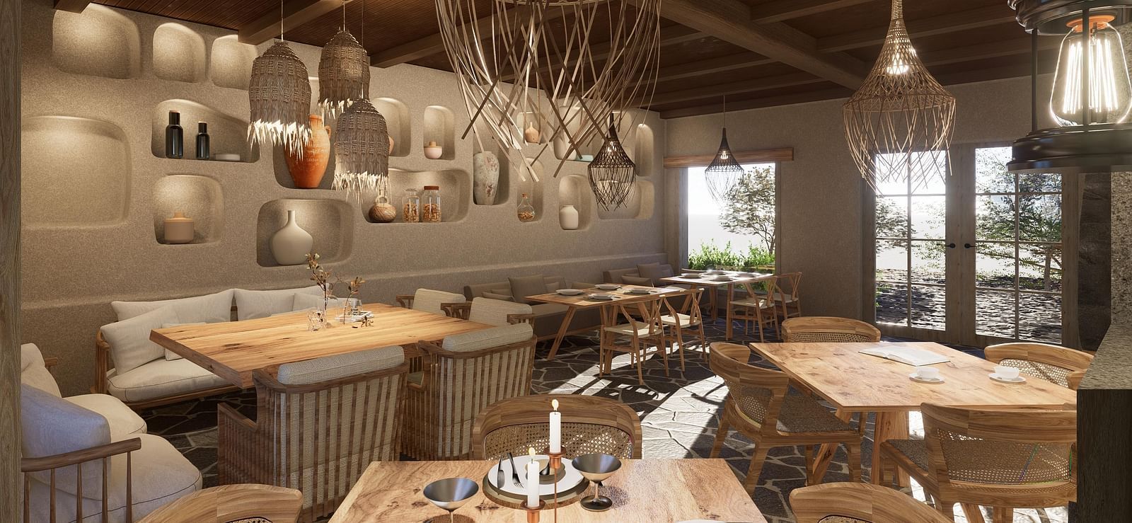 Dining area with tables and chairs set, and a chandelier hanging from the ceiling at The Evren, Vagator.
