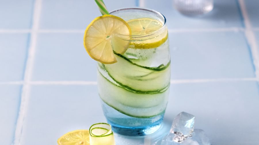 A glass of Cucumber Lemon Cooler kept next to ice | Mango Hill, Pondicherry