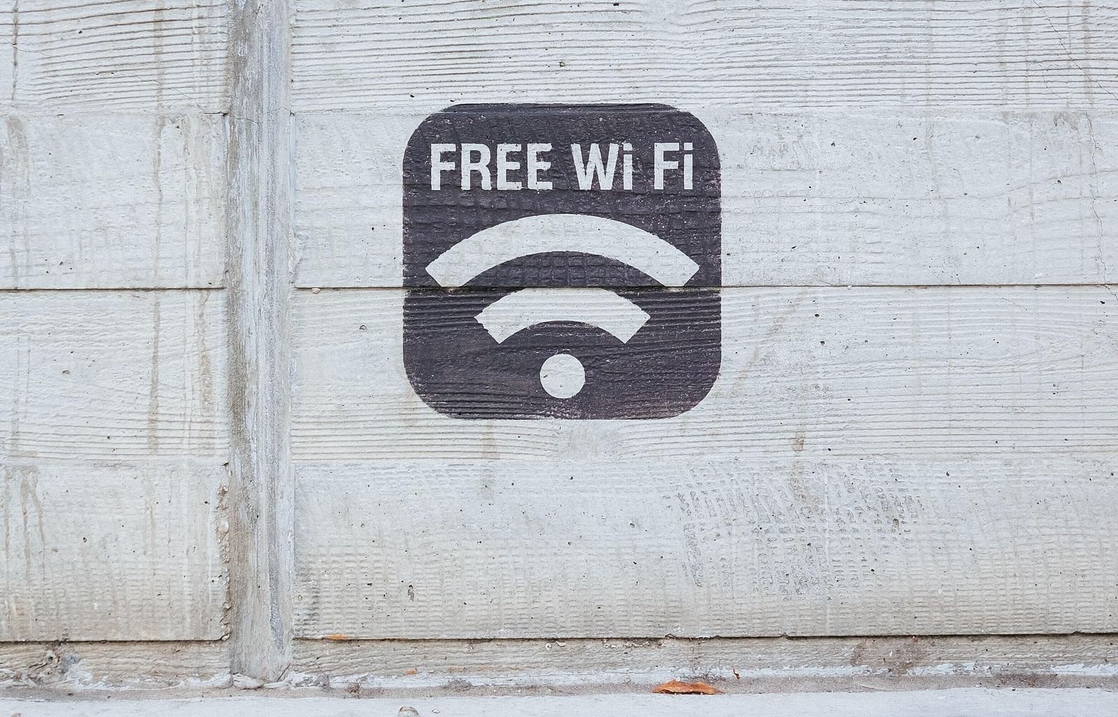 An icon with a text free wifi and a logo of wifi