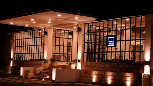 the facade of Sohra House during night time 
