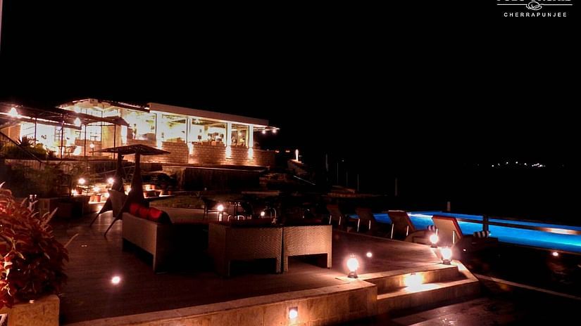 one of our hotels lit up at night 