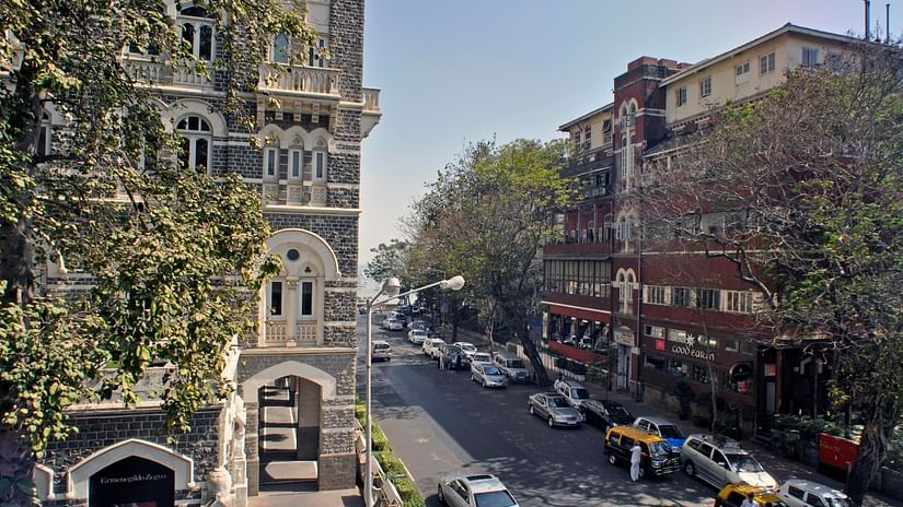 View from the room at Hotel Diplomat with many cars parked on the road