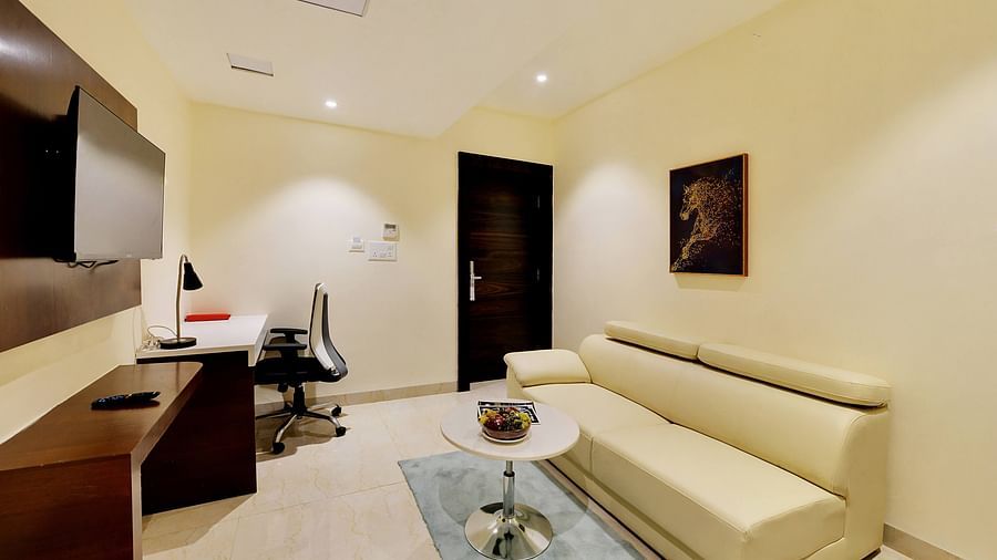 living room side view with a accompanying tea table in front of sofa for a complete lounge experience.