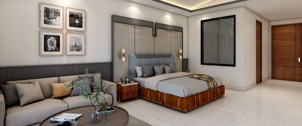 A spacious room featuring a double bed alongside a common seating area. - Namaste Corbett