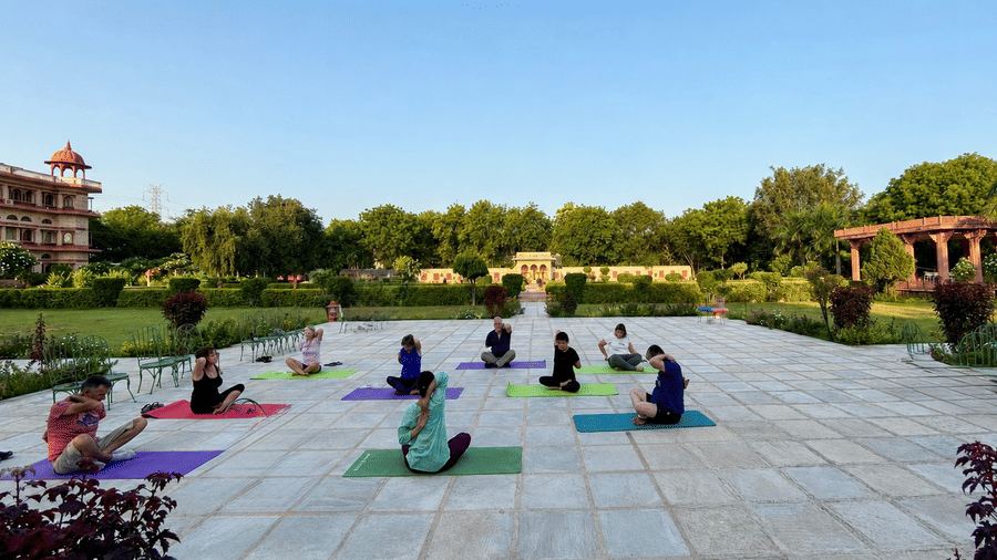 Morning yoga in the palace garden-Resorts Near Delhi NCR