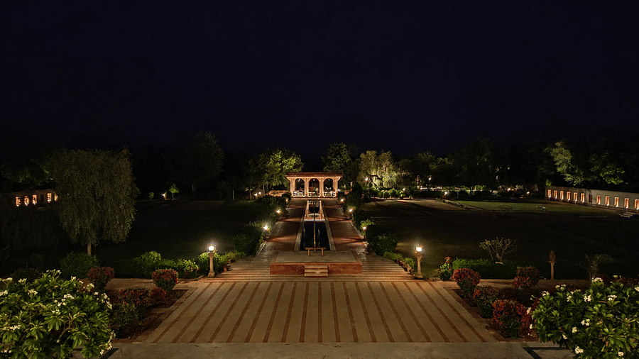 Symmetrical palace gardens under navy skies-Umaid Palace Dausa-Resort Near Jaipur
