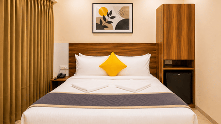 Comfortable room at Urban Comforts featuring modern interiors, warm lighting, and thoughtfully designed furnishings
