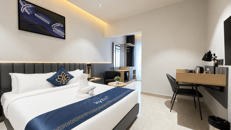 Business Rooms bed and TV view – Hotel Kyzen, Shamshabad Airport, Hyderabad