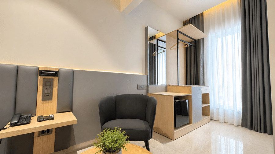 Business Rooms seating and wardrobe area – Hotel Kyzen, Shamshabad Airport, Hyderabad