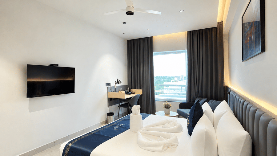 Premium Suite King Bed with TV window – Hotel Kyzen, Shamshabad Airport, Hyderabad