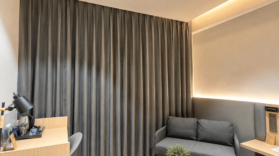 Premium Suite King Beds lounge corner – Hotel Kyzen, Shamshabad Airport, Hyderabad