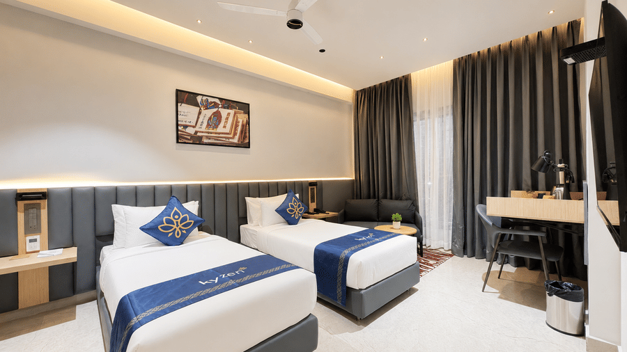 Premium Suite King Beds with artwork – Hotel Kyzen, Shamshabad Airport, Hyderabad