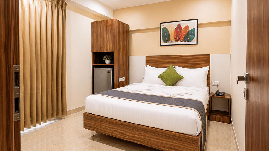 Spacious accommodation at Urban Comforts with refined interiors, modern furnishings, and a comfortable stay experience