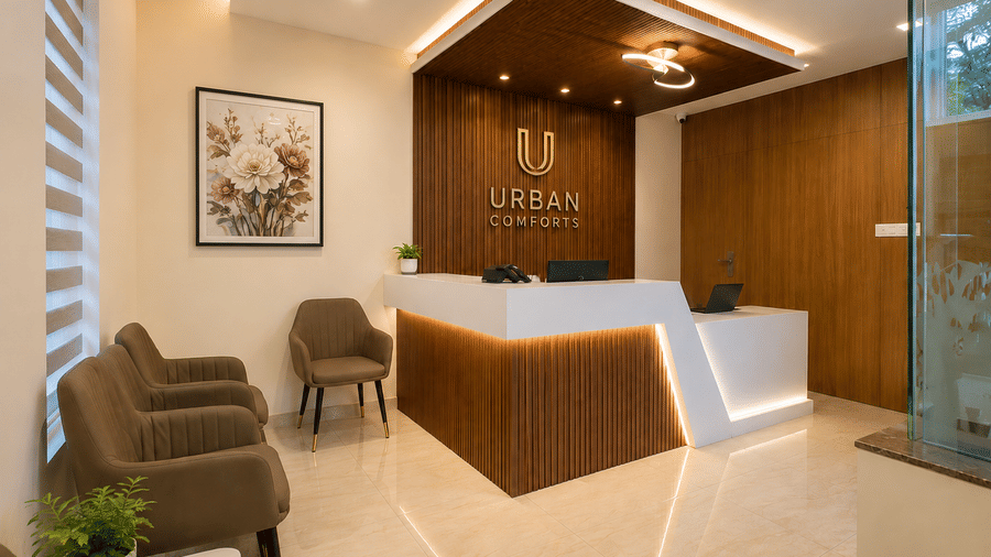 Reception and lobby area at Urban Comforts featuring contemporary interiors and a welcoming seating space