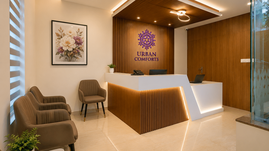Reception area at Urban Comforts featuring contemporary décor, elegant seating, and a welcoming atmosphere
