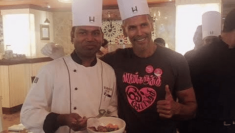 Chef Sathya and Milind Soman posing for a picture at Hablis Hotel, Chennai