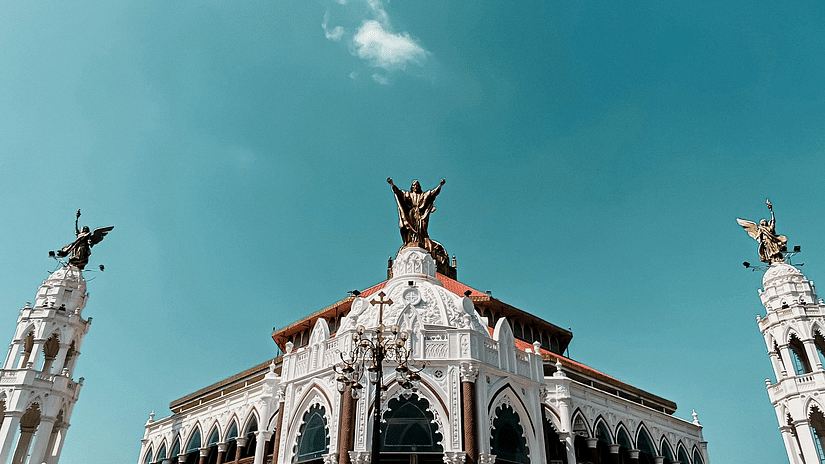 architural wonder at edapally, a magnificent structure standing tall and clear blue skies in vision.