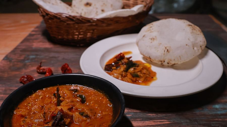 A close up shot of rice roti with chicken curry at The canopy, Capitol Village Resort, Madikeri