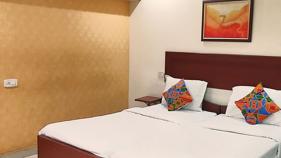 Spacious Executive Room at Udipi Home with double bed and modern decor