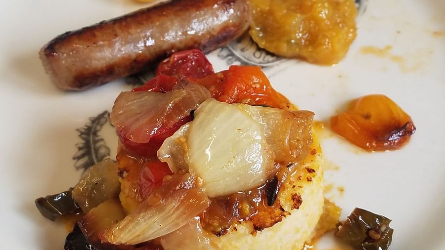 A gourmet dish featuring a perfectly cooked entree with sides - Brewery Gulch Inn & Spa
