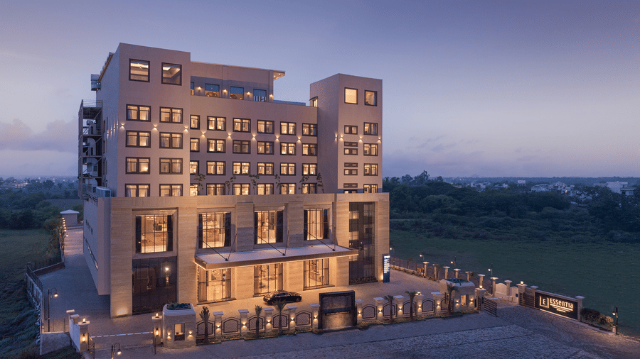 A multi storeyed building with sky in the backdrop.