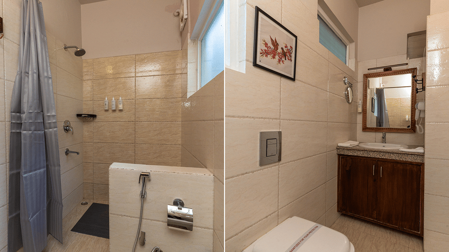 Efficient and clean ensuite bathroom with neutral tiling and modern white fixtures at Maati Resort By The Lake Hill, Jeolikote.