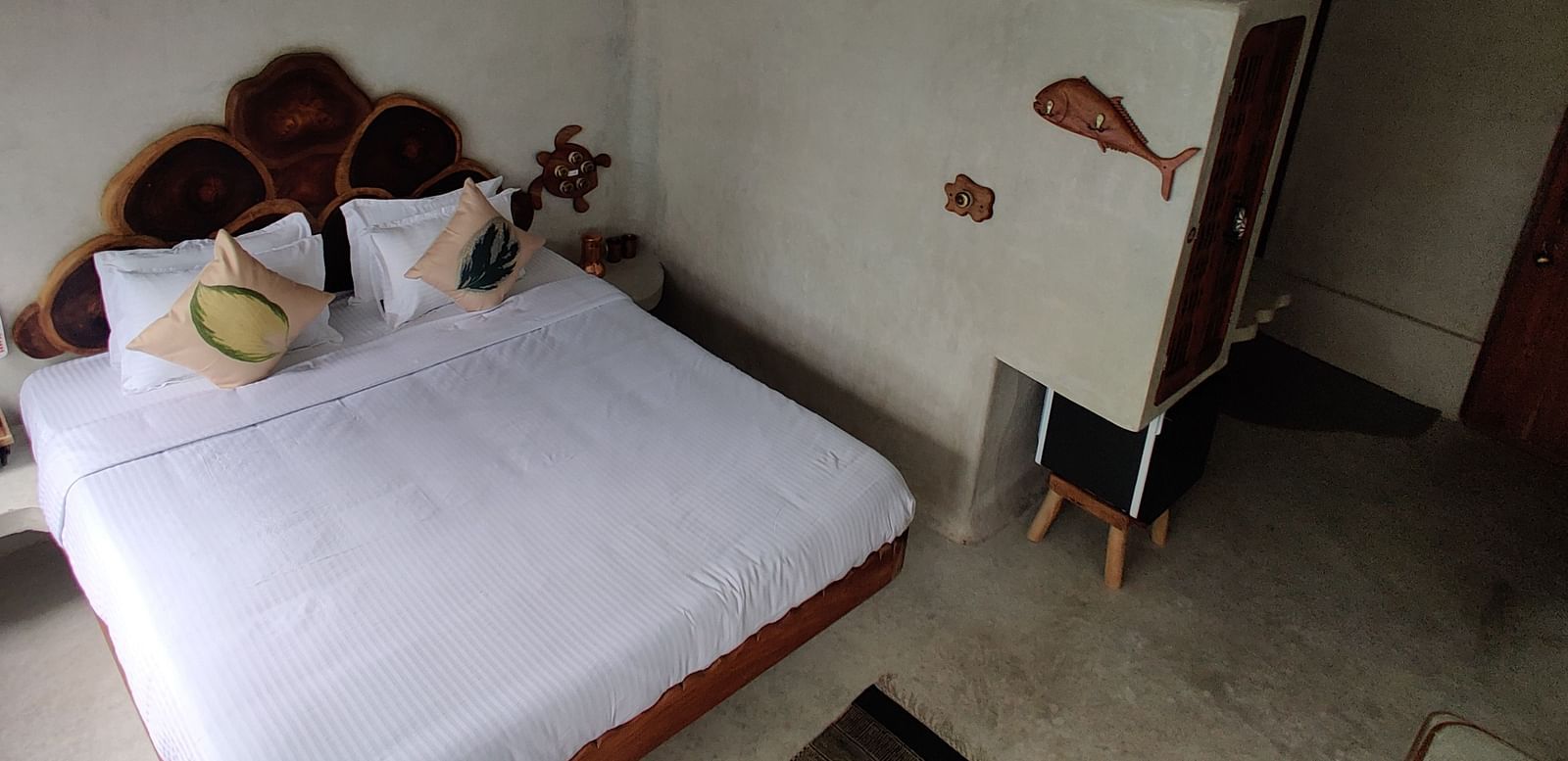 Albacore room featuring an airy and naturally bright room with a plush bed and plenty of space to move around.