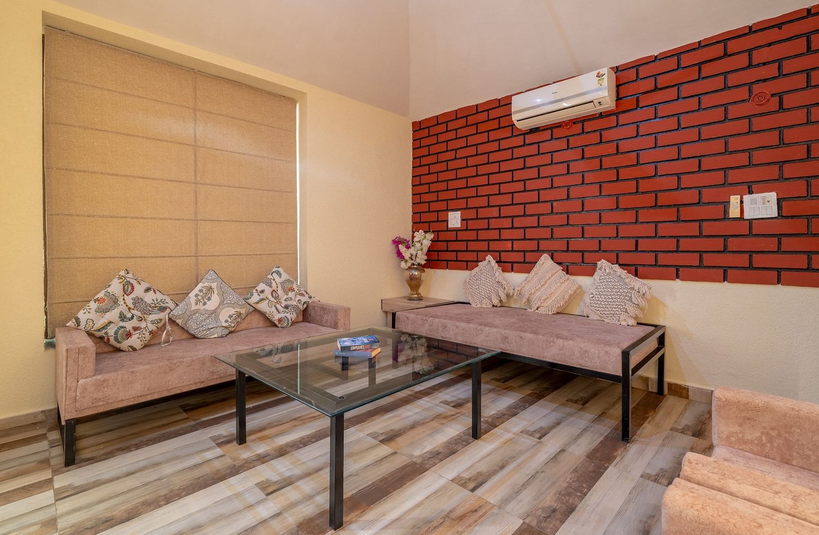 A seating area at Valley by Grassfield featuring sofas and a table in front.