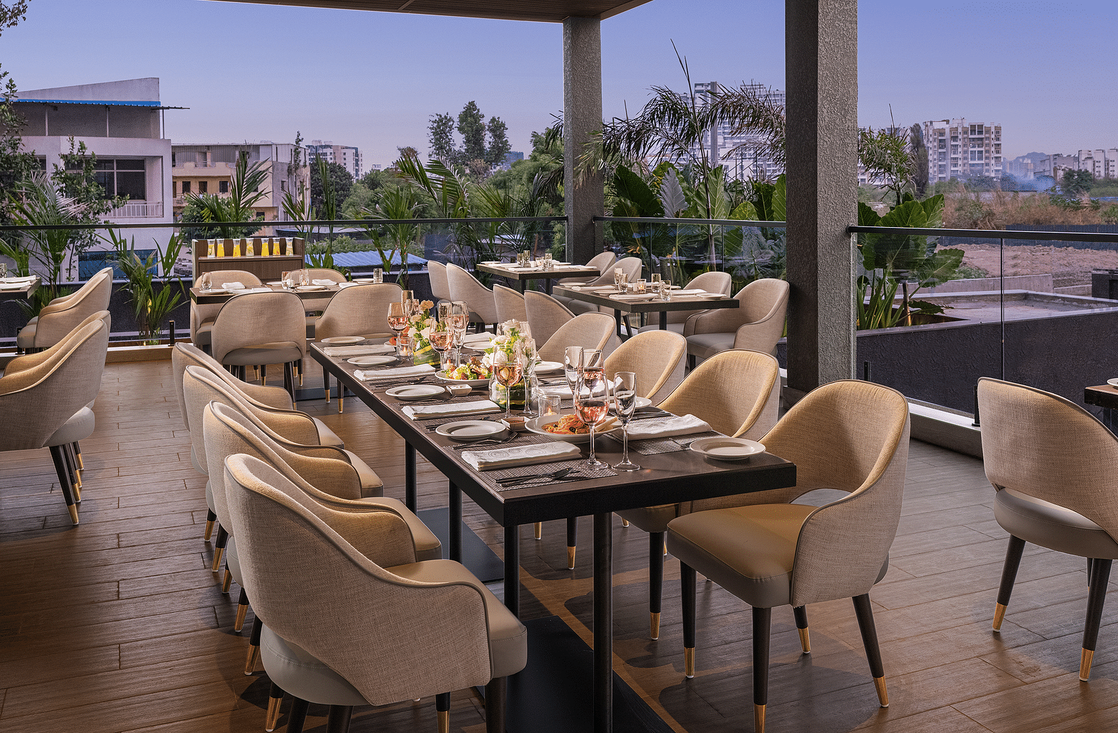 A view of dining area at Citron Bar with comfortable seating at Essentia Premiere, Pune.