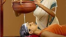 Woman getting a hair spa