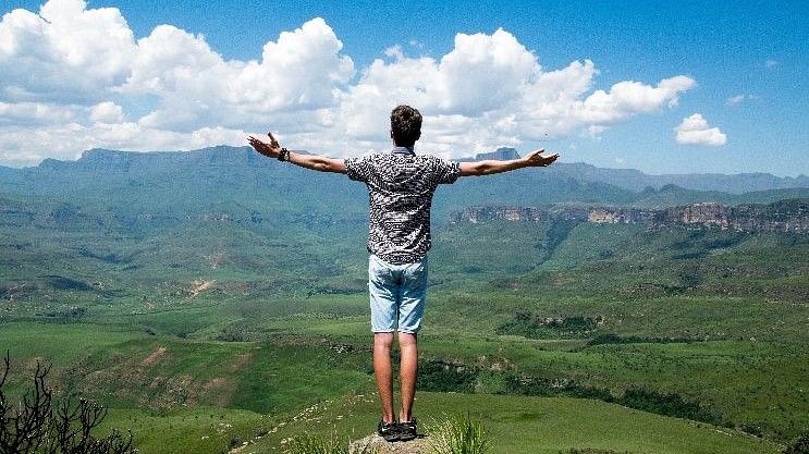Man standing at the cliff