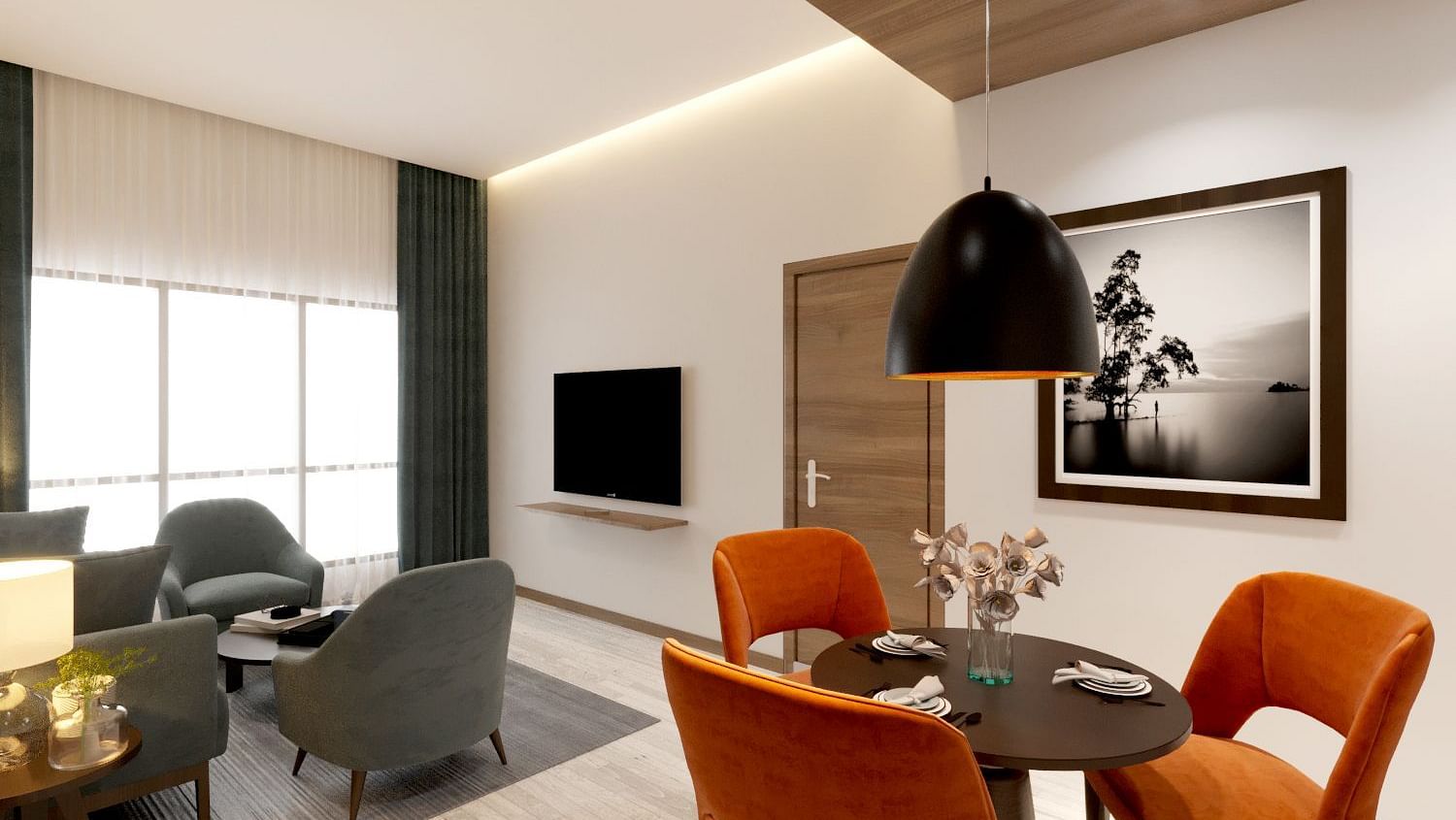 the living room of a Two Bedroom Suite in Kinshasa at Kertel Suites with a dining area and a wall mounted television