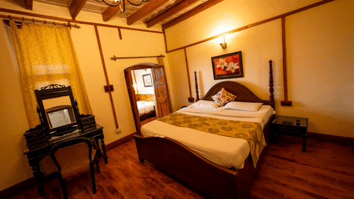 Spacious Heritage Family Suite with a cosy bed and lighting at Himalaya Hotel, Nainital