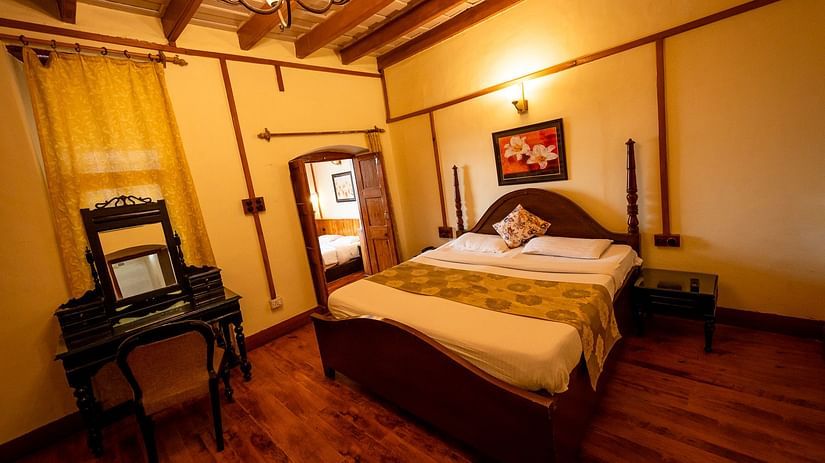 Spacious Heritage Family Suite with a cosy bed and lighting at Himalaya Hotel, Nainital