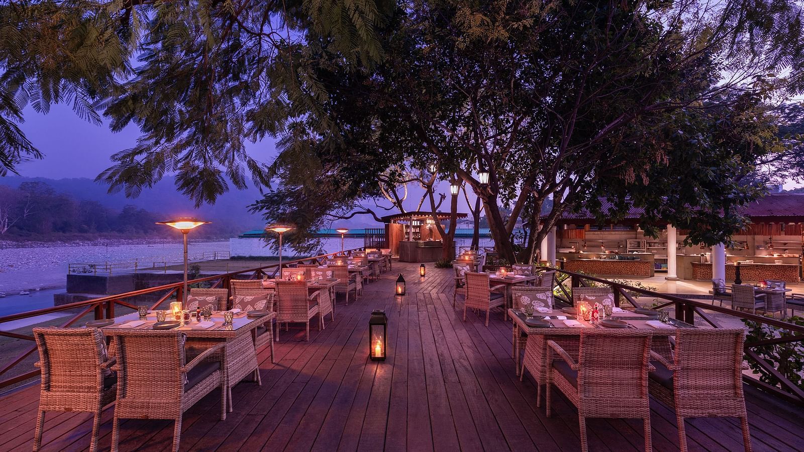 An image of an outdoor dining area beside a lake - The Riverview Retreat,  Corbett