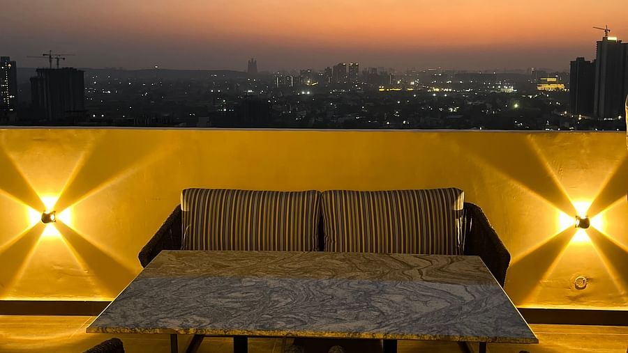 Seating arrangements on the rooftop - Outdoor Sunset Flagship - Rhythm Gurugram