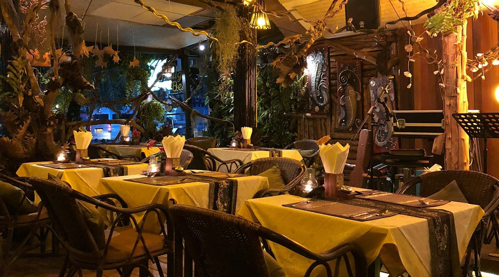 A restaurant showcasing the seating arrangement with lighting and decor