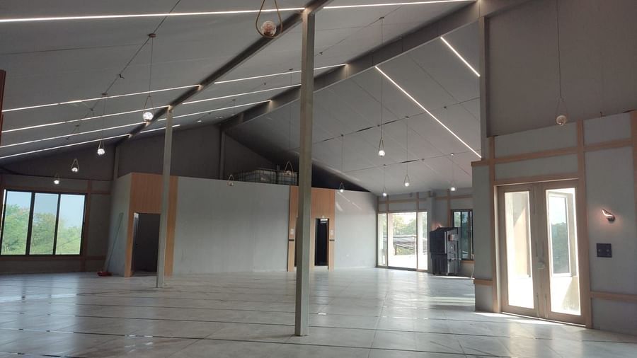 An image of a banquet hall with pillars in the middle at VITS Roccia Hill Resort & Adventure Park.