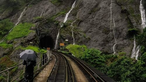 a waterfall cascading down a hill 4