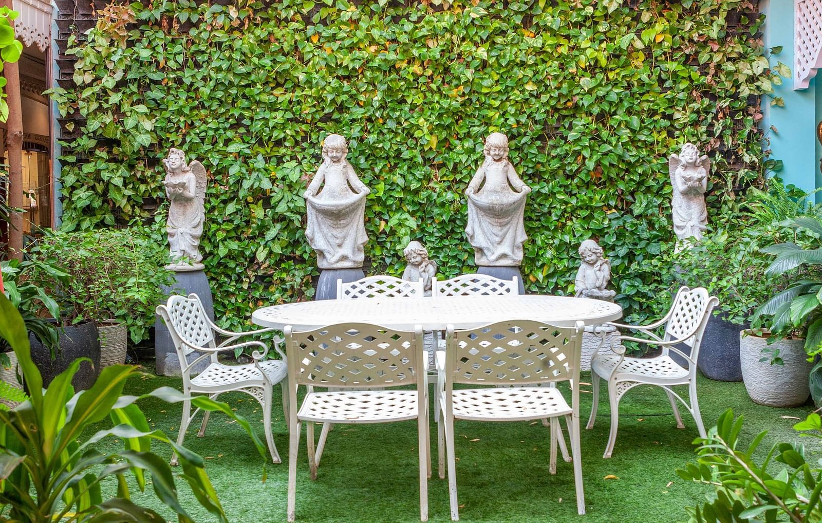 seating space amidst a garden - Mayfair Lake Resort, Raipur