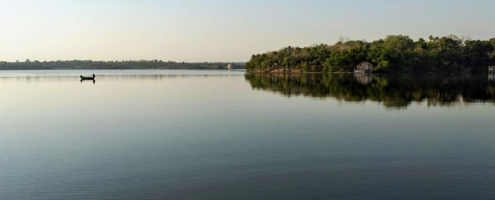 Ambazari Lake in Nagpur, Maharashtra, showing large water body with surrounding greenery and embankment.