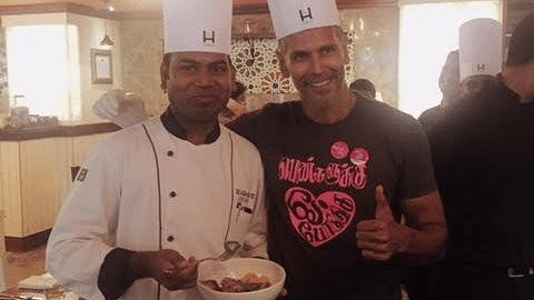 Chef Sathya and Milind Soman posing for a picture at Hablis Hotel, Chennai
