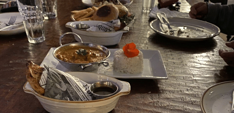 A dining table with different food items