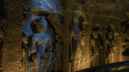 Ancient rock-cut sculptures in a cave.