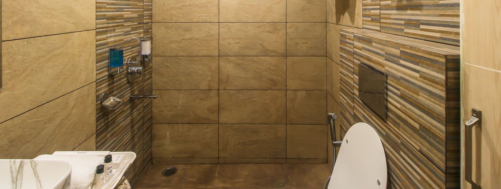 Accessible bathroom facilities at Hotel Diamond Plaza, Chandigarh