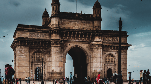 the brown building of Gateway of India