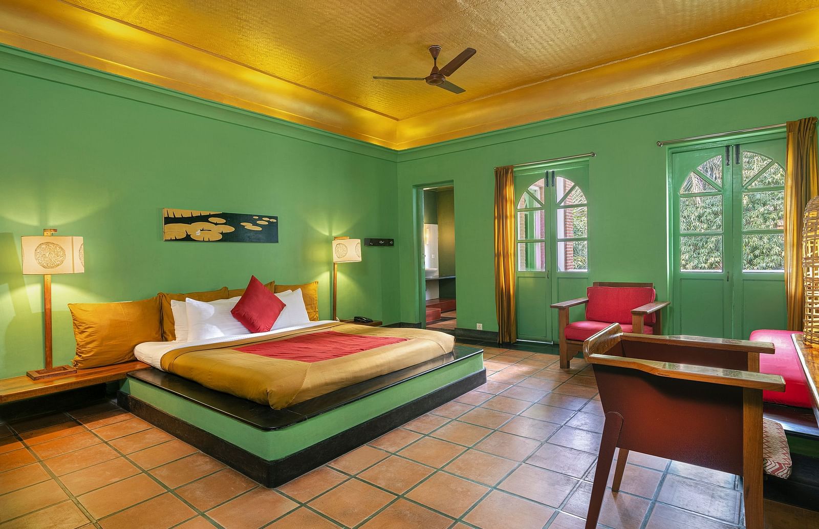 A double bed with side tables and lamps inside French Classic | Mango Hill, Pondicherry