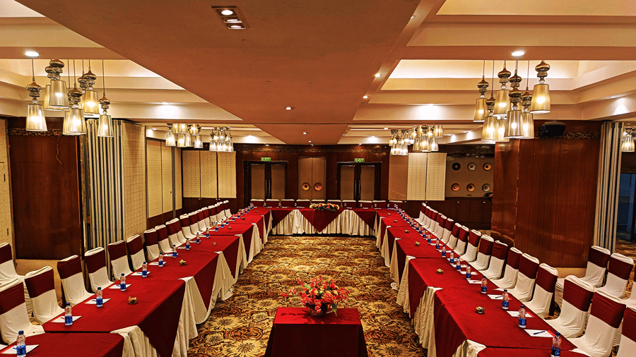 Banquet hall setup with chairs arranged in a U-shaped setting - Senses Hotel